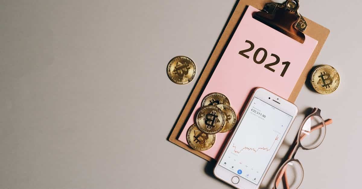 flat-lay-of-bitcoins-smartphone-eyeglasses-and-clipboard-with-2021-text-symbolizing-cryptocurren